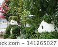 Two panda sculptures covered in plants line the entrance to Ueno Park in summer. 141265027
