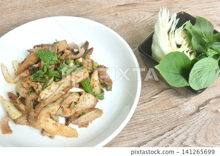 slice barbrcue pork neck with chop shallot and chili Thai food salad taste spicy and sour on plate eat couple fresh vegetable in cup slice barbrcue pork neck with chop shallot and chili Thai food salad taste spicy and sour on plate eat couple fresh vegetable in cup 141265699