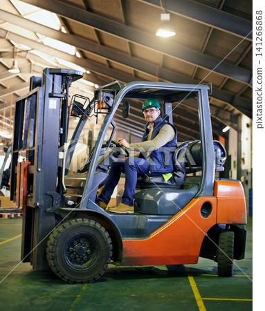 Portrait, warehouse and man with forklift working on site, loading on dock with Industrial moving vehicle. Transporting, shipping inventory with safety hardhat for delivery, labor worker for company Portrait, warehouse and man with forklift working on site, loading on dock with Industrial moving vehicle. Transporting, shipping inventory with safety hardhat for delivery, labor worker for company 141266868