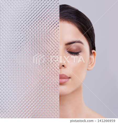Glass, half and woman for aesthetic, beauty and dermatology for skincare and cosmetology in studio. Young person, model or lady and isolated for wellness and lipstick for full lips and eyeshadow Glass, half and woman for aesthetic, beauty and dermatology for skincare and cosmetology in studio. Young person, model or lady and isolated for wellness and lipstick for full lips and eyeshadow 141266959