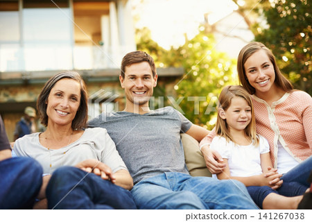 Family, happiness and portrait in garden on sofa for bonding, love and memories together. Fun, backyard and relax in summer for relationship growth or connection with unity and affection on vacation. Family, happiness and portrait in garden on sofa for bonding, love and memories together. Fun, backyard and relax in summer for relationship growth or connection with unity and affection on vacation. 141267038