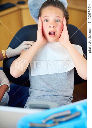 Dental, fear and portrait of girl with dentist in consultation room for phobia, comfort or news. Orthodontics, stress and kid with anxiety for teeth, cavity or bacteria, risk or gum disease emergency Dental, fear and portrait of girl with dentist in consultation room for phobia, comfort or news. Orthodontics, stress and kid with anxiety for teeth, cavity or bacteria, risk or gum disease emergency 141267064