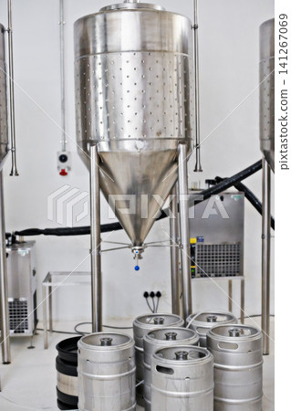 Steel tank, beer manufacturing and distillery with equipment for process, factory or brewery with craft drink. Alcohol, metal container and industrial machine, brewing system and tools for production 141267069