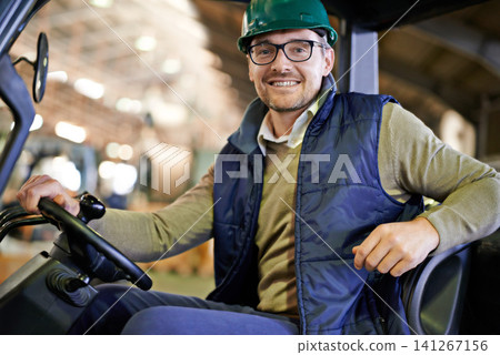 Man, portrait and forklift in factory or logistics distribution for supply chain warehouse, import or delivery. Male person, face and hardhat for supplier manufacturing or courier, storage or driving Man, portrait and forklift in factory or logistics distribution for supply chain warehouse, import or delivery. Male person, face and hardhat for supplier manufacturing or courier, storage or driving 141267156