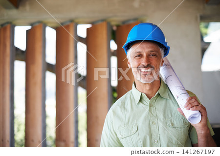 Architect, floor plan and construction site in portrait for building luxury house, apartment or residence. Man, blueprint and hard hat on for safety, protection or shelter smiling and confident Architect, floor plan and construction site in portrait for building luxury house, apartment or residence. Man, blueprint and hard hat on for safety, protection or shelter smiling and confident 141267197