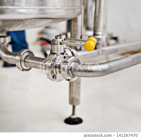 Factory, craft beer and tube for production, manufacturing and metal pipes in industrial workshop. Warehouse, plant or closeup for alcohol, steel and machine for lager, stout and valve in container Factory, craft beer and tube for production, manufacturing and metal pipes in industrial workshop. Warehouse, plant or closeup for alcohol, steel and machine for lager, stout and valve in container 141267470