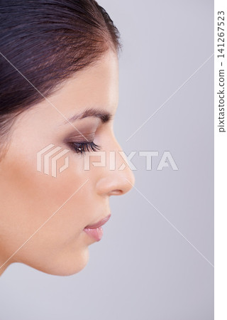 Woman, face and beauty for cosmetology, dermatology and skincare for hygiene and aesthetic in studio. Model, lady and isolated with makeup, eyeshadow and lipstick for full lips and eyelash on mockup Woman, face and beauty for cosmetology, dermatology and skincare for hygiene and aesthetic in studio. Model, lady and isolated with makeup, eyeshadow and lipstick for full lips and eyelash on mockup 141267523