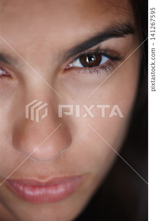 Woman, beauty and closeup face in studio, skincare and cosmetology for natural female person with brown eyes. Clean skin, serious expression with healthy glow for wellness, determination and eyebrows Woman, beauty and closeup face in studio, skincare and cosmetology for natural female person with brown eyes. Clean skin, serious expression with healthy glow for wellness, determination and eyebrows 141267595