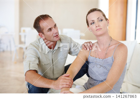 Divorce, couple or conversation in home for fight, conflict or ignore in living room. Sad woman, man or breakup with depression, anger or frustrated with stress in argument for marriage fail on sofa Divorce, couple or conversation in home for fight, conflict or ignore in living room. Sad woman, man or breakup with depression, anger or frustrated with stress in argument for marriage fail on sofa 141267863