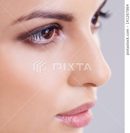 Woman, beauty and cosmetic in zoom, makeup and skincare for dermatology, skin and health. Female person, face and wellness in studio, white background and clean with glow, foundation and gloss Woman, beauty and cosmetic in zoom, makeup and skincare for dermatology, skin and health. Female person, face and wellness in studio, white background and clean with glow, foundation and gloss 141267864