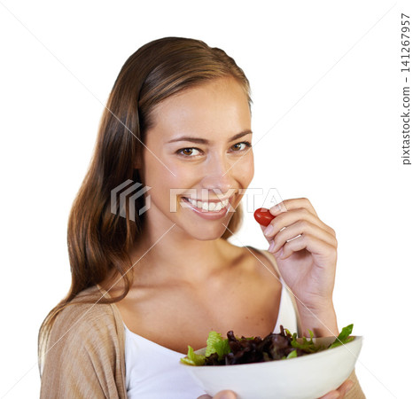 Woman, studio and eating a salad in portrait for nutrition, healthy meal and white background. Female person, diet and fresh produce for vegan lunch, organic ingredients and vitamins or minerals Woman, studio and eating a salad in portrait for nutrition, healthy meal and white background. Female person, diet and fresh produce for vegan lunch, organic ingredients and vitamins or minerals 141267957