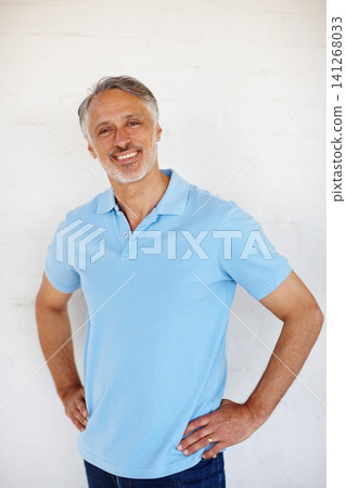 Portrait, confidence and smile of senior man on brick wall for fashion isolated on a white background in Switzerland. Face, mature and happy person in casual clothes, shirt and positive for style Portrait, confidence and smile of senior man on brick wall for fashion isolated on a white background in Switzerland. Face, mature and happy person in casual clothes, shirt and positive for style 141268033