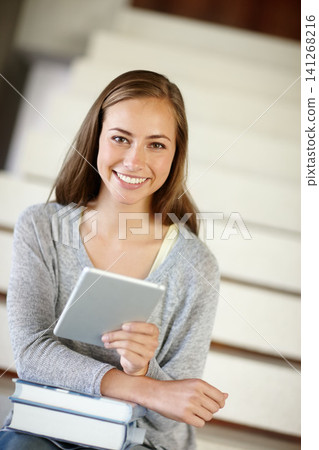 Student, girl and books with tablet, portrait and smile for learning, education and app at campus. Woman, touchscreen and textbook for studying, development and happy with online course on stairs 141268216