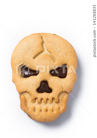Halloween skull cookie with chocolate filling Halloween skull cookie with chocolate filling 141268835