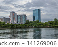 A view of Osaka Business Park and the Second Neyagawa River under a cloudy sky. 141269006