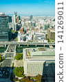 A bird's-eye view overlooking the area around Osaka City Hall and the Midosuji and Hanshin Expressway. 141269011