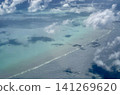 Beautiful coral reefs and emerald green sea viewed from the window of an airplane. 141269620