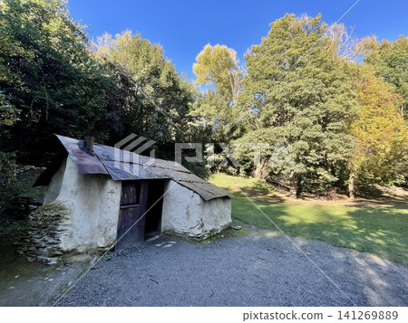 Historic white stucco huts of Chinese immigrants remain in Arrowtown, New Zealand. Historic white stucco huts of Chinese immigrants remain in Arrowtown, New Zealand. 141269889