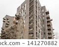 Modern brick apartment building in urban residential area 141270882