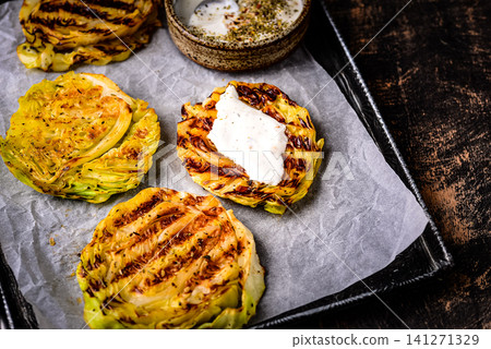 Grilled o cabbage steaks, vegan food Grilled o cabbage steaks, vegan food 141271329