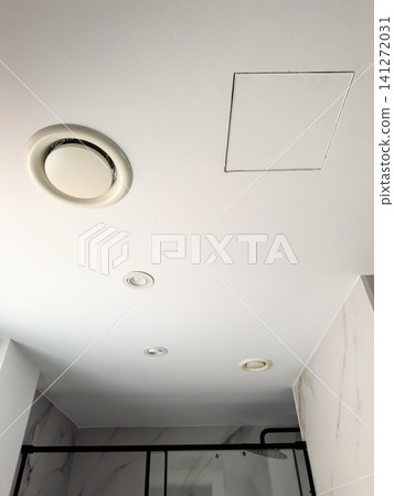 A round ceiling exhaust vent with recessed downlights and an access hatch in a bathroom ceiling. Bathroom ventilation A round ceiling exhaust vent with recessed downlights and an access hatch in a bathroom ceiling. Bathroom ventilation 141272031