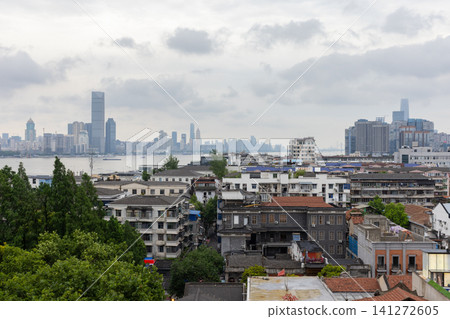 Wuhan city, the capital of Hubei, China. An urban river cityscape Wuhan city, the capital of Hubei, China. An urban river cityscape 141272605