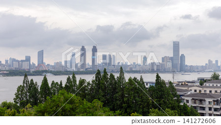 A wide Wuhan city skyline across Yangtze river A wide Wuhan city skyline across Yangtze river 141272606
