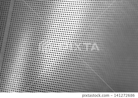 Metal texture with many tiny round wholes 141272686