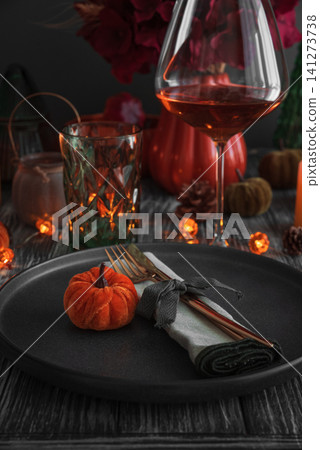 Autumnal table setting preparing for Thanksgiving dinner Autumnal table setting preparing for Thanksgiving dinner 141273738