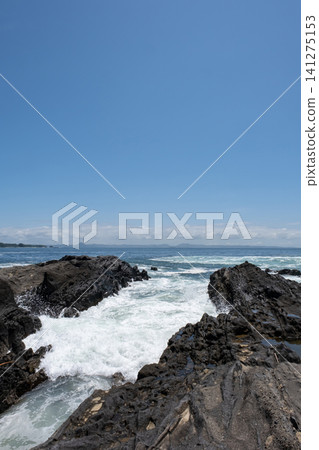 Waves crashing against the rocky shore of Jogashima Island in Miura City Waves crashing against the rocky shore of Jogashima Island in Miura City 141275153