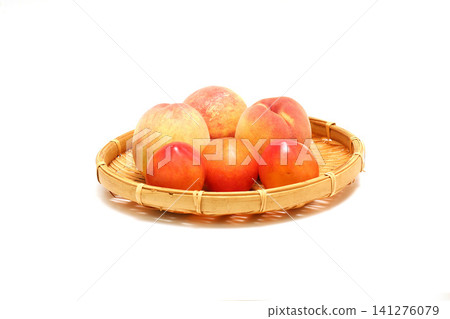 Peaches and plums on a sieve Peaches and plums in a basket 141276079