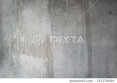 Grey, rough concrete wall surface Grey, rough concrete wall surface 141276984