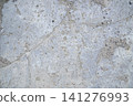 Grey concrete surface with many scratches 141276993
