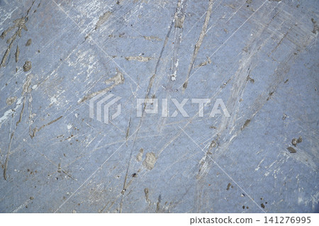 Grey concrete surface with many scratches Grey concrete surface with many scratches 141276995