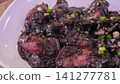 Traditional Southern Thai Stir Fried Squid in Rich Black Ink Sauce 141277781