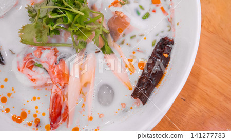 Creamy Thai Coconut Tom Yum Seafood Soup 141277783