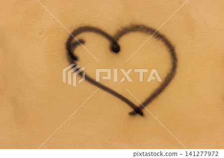 Hand drawn heart symbol on textured plaster wall Hand drawn heart symbol on textured plaster wall 141277972