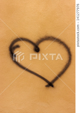 Hand drawn heart symbol on textured plaster wall Hand drawn heart symbol on textured plaster wall 141277976