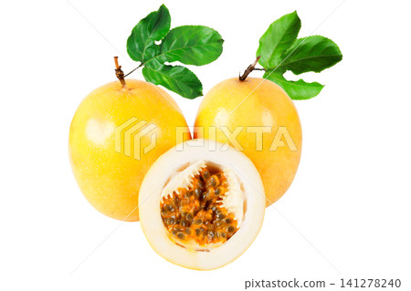 Two fresh yellow passion fruit with one sliced half showing juicy pulp and seeds, arranged with green leaves and isolated on a white background Two fresh yellow passion fruit with one sliced half showing juicy pulp and seeds, arranged with green leaves and isolated on a white background 141278240