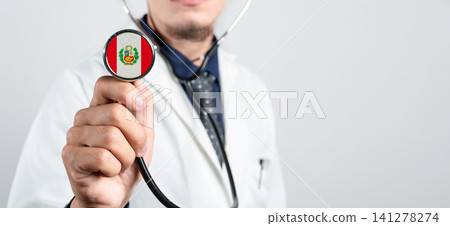 Peru healthcare system, Peruvian national healthcare concept. Hand of doctor holding stethoscope Peru healthcare system, Peruvian national healthcare concept. Hand of doctor holding stethoscope 141278274