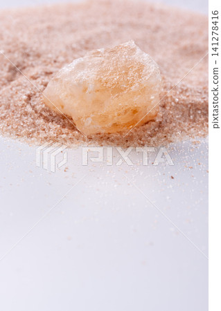 Rock salt crystals used in cooking, pink granules and copy space Rock salt crystals used in cooking, pink granules and copy space 141278416
