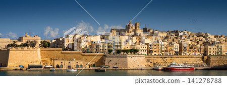 VALLETTA, MALTA - NOVEMBER 12, 2018 - In bay The Grand Harbor Tricity of Valletta, Birgu and Senglea on the island Malta VALLETTA, MALTA - NOVEMBER 12, 2018 - In bay The Grand Harbor Tricity of Valletta, Birgu and Senglea on the island Malta 141278788