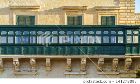 Typical Maltese covered balconies in Valetta, Malta Typical Maltese covered balconies in Valetta, Malta 141278895