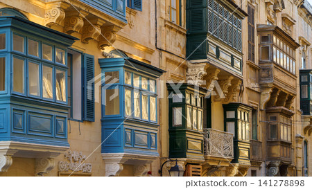 Typical Maltese covered balconies in Valetta, Malta Typical Maltese covered balconies in Valetta, Malta 141278898