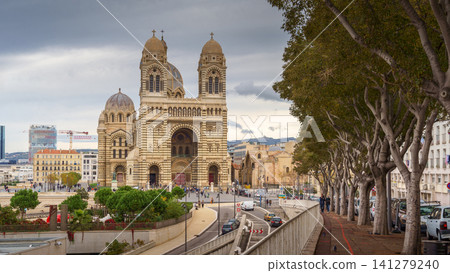 MARSEILLE, FRANCE - 10 Nov 2018 - La Major cathedral with people, trees and traffic MARSEILLE, FRANCE - 10 Nov 2018 - La Major cathedral with people, trees and traffic 141279240
