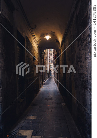GENOA, ITALY - NOVEMBER 04, 2018 - Narrow streets of the old city GENOA, ITALY - NOVEMBER 04, 2018 - Narrow streets of the old city 141279885