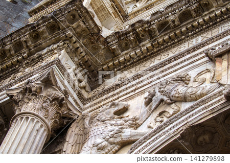 NAPLES, ITALY - NOVEMBER 05, 2018 - The medieval castle of Maschio Angioino or Castel Nuovo or New Castle and its elements of decoration, Napoli NAPLES, ITALY - NOVEMBER 05, 2018 - The medieval castle of Maschio Angioino or Castel Nuovo or New Castle and its elements of decoration, Napoli 141279898