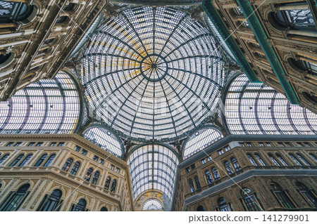 NAPLES, ITALY - 05 NOVEMBER, 2018 - Galleria Umberto I, a public shopping gallery in Napoli and its interiors 141279901