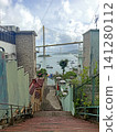 View of a suspension bridge and harbor from a village staircase View of a suspension bridge and harbor from a village staircase 141280112