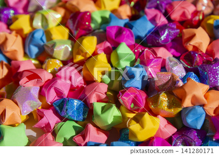 It is a collection of paper stars. It is a collection of paper stars. 141280171